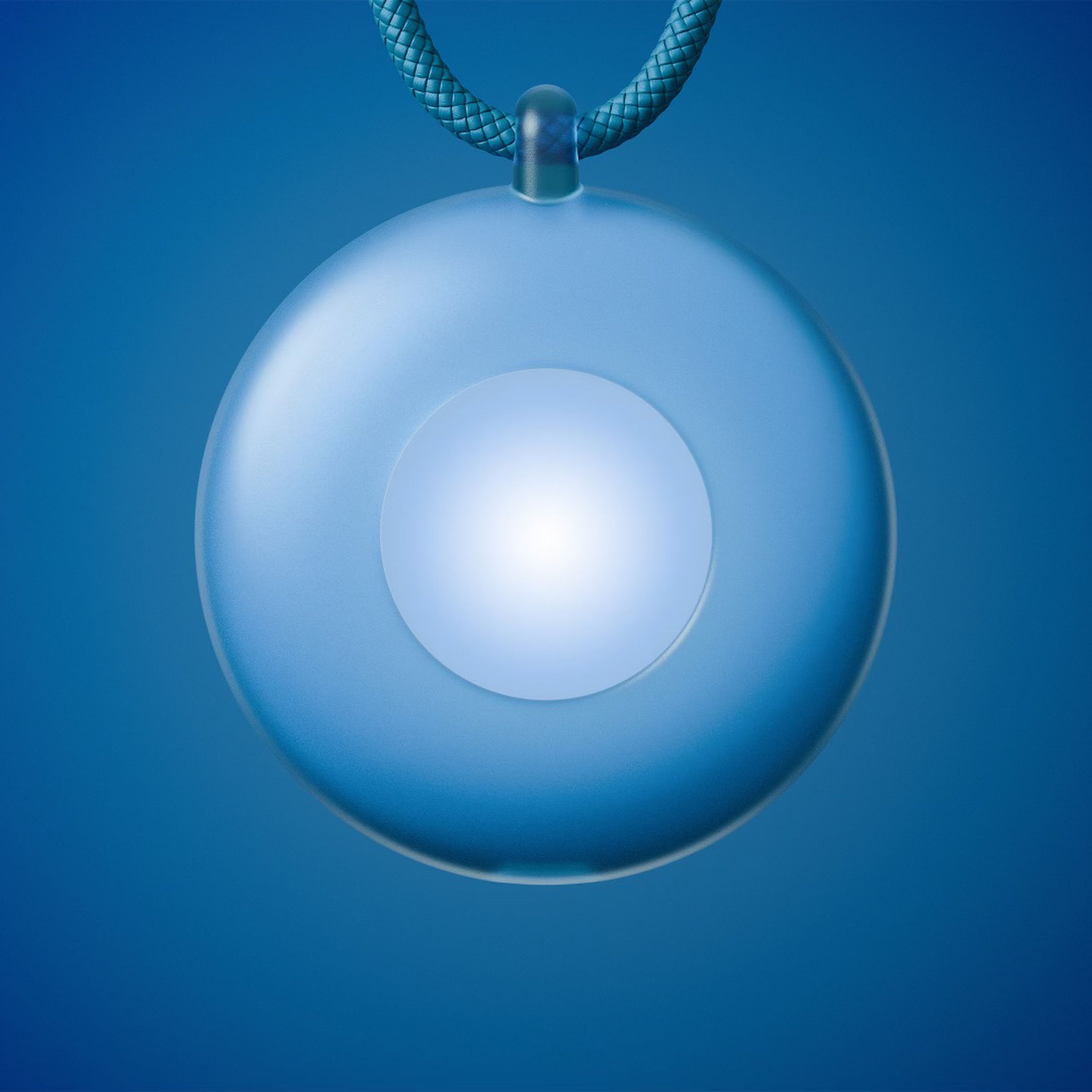 A photo of a blue orb on a necklace.