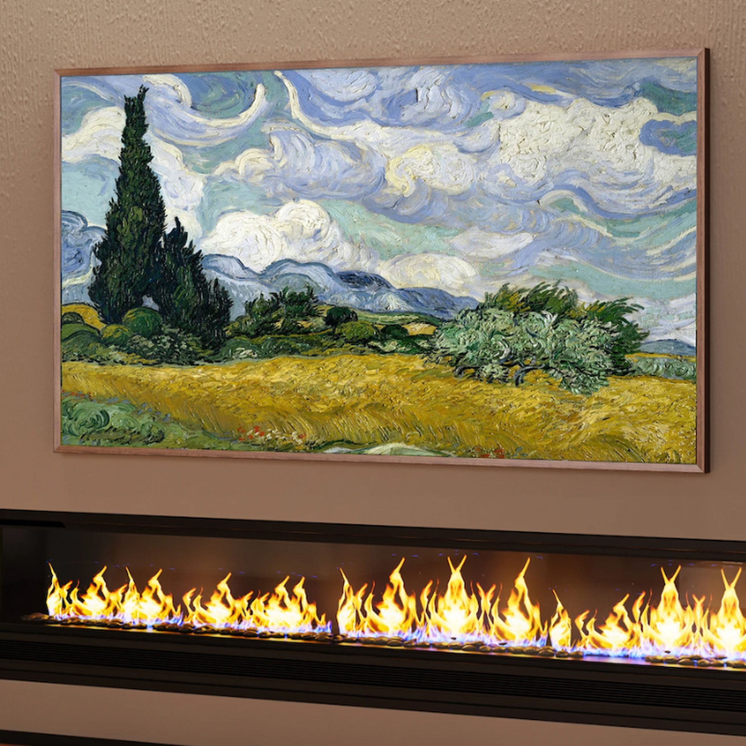 The Hisense CanvasTV displaying a landscape painting while hanging on a wall above a gas fireplace.