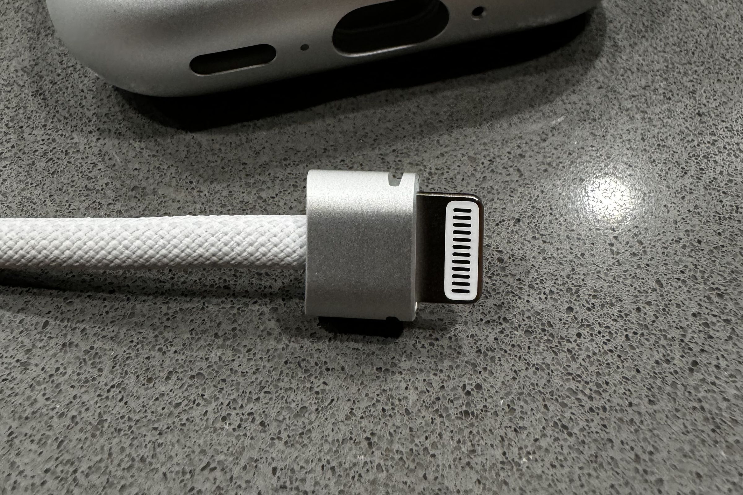 A picture of the connector from the Vision Pro battery. It looks like a Lightning connector, only wider and with four extra pins.